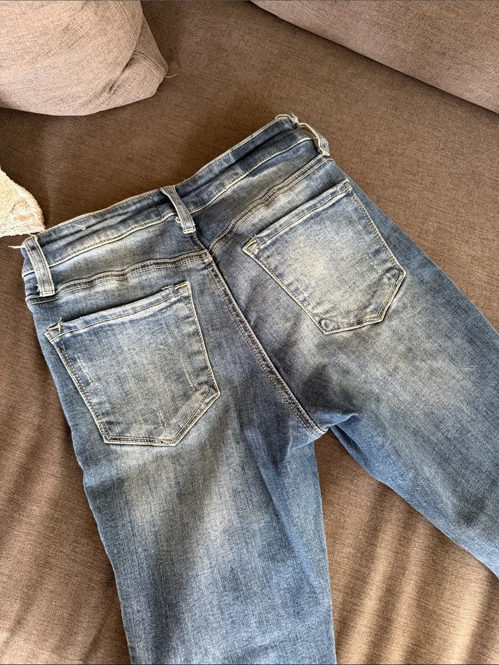 Ripped Light Blue Skinny Jeans with Button-Fly